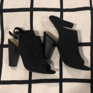 Black peep toe faux suede heels.